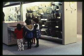 Group of children in visible storage