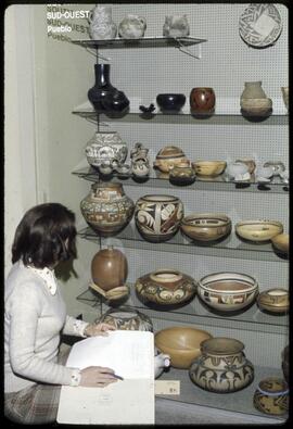 Museum staff in visible storage
