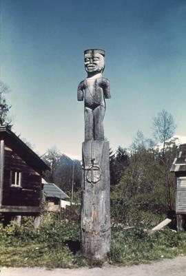 Totem pole in unidentified village