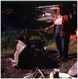People (Haida): woman roasting cedar roots